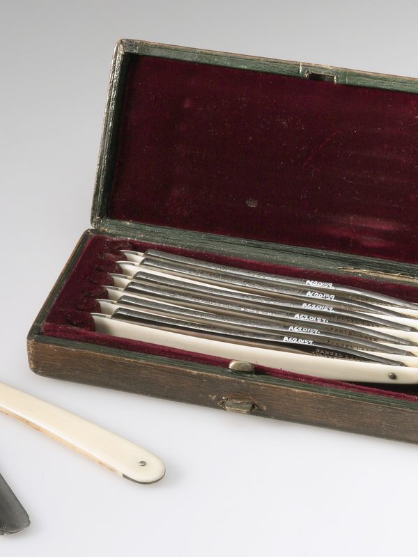 A cased set of seven cut-throat razors
