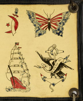 A hand-painted flash sheet laced onto a dark leather board: an anchor, a dagger, a butterfly, a clipper ship and an eagle.