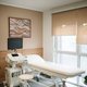 Ultrasound unit beside a treatment couch