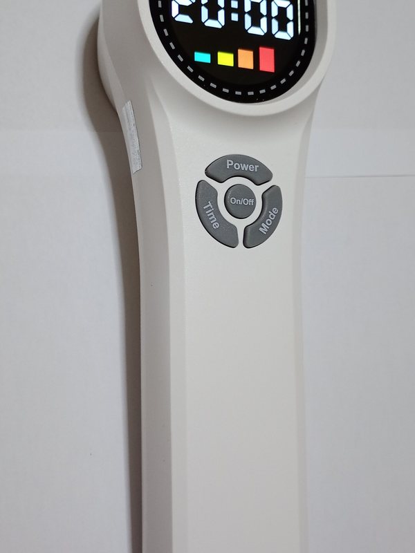 A low-level laser therapy unit on its stand