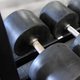 A row of dumbbells on the rack