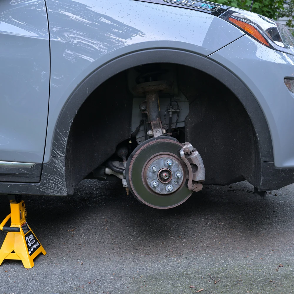 Front wheel removed to expose the brake disc and hub