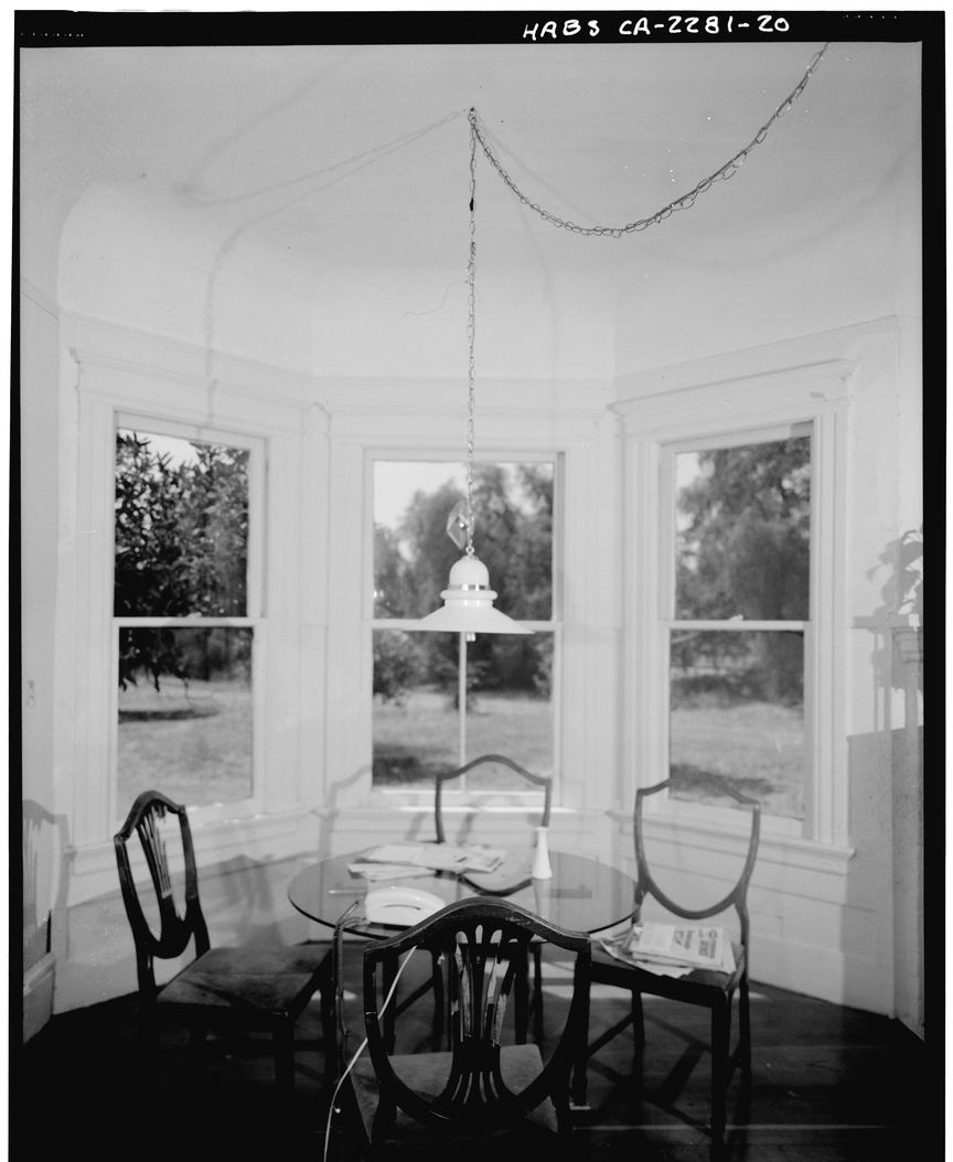 A first-floor dining room bay window recorded in close detail for a building survey. An interior, not a photograph of a member of staff.