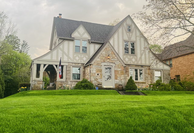 Marigold Lane Tudor — half-timbered Tudor-revival house with a steep gable