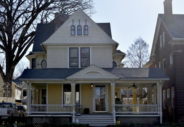 Ashcroft Victorian — yellow clapboard Victorian with a wraparound porch
