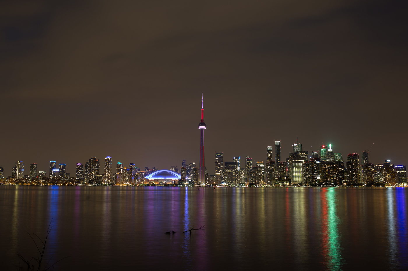 Downtown skyline reflected in the harbour at night