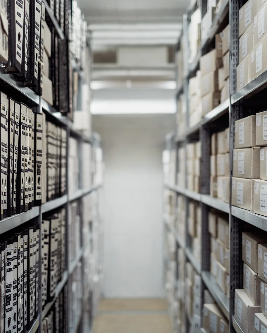 A vertical view of shelved storage running the length of an aisle.