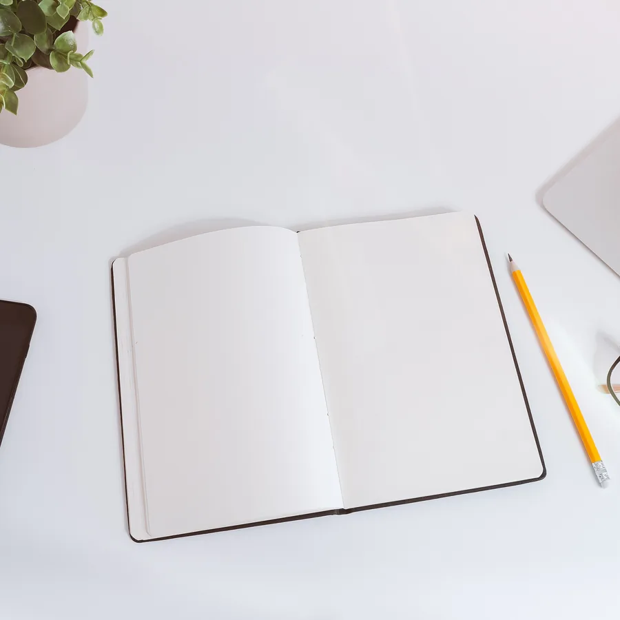 Open notebook and pencil ready for a session