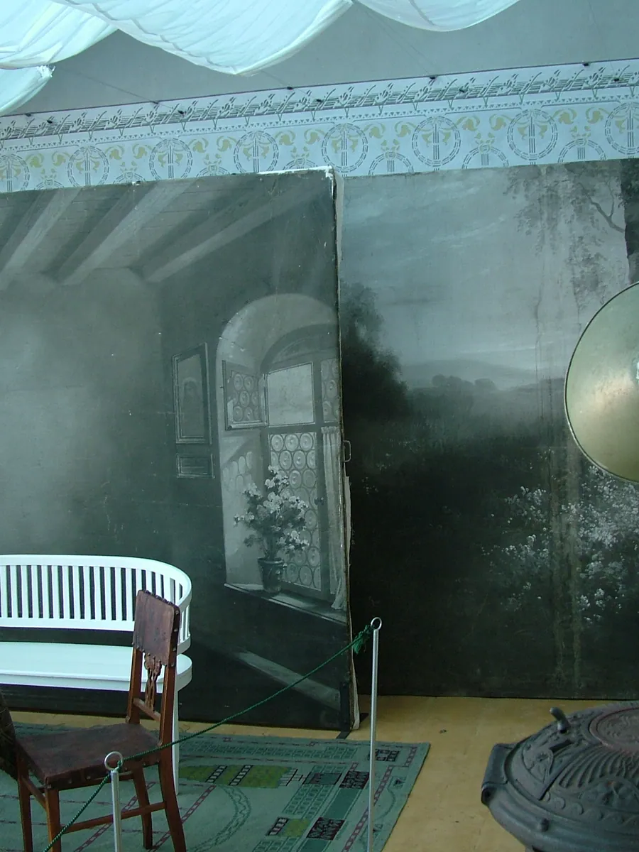 Close view of a painted studio backdrop and seating
